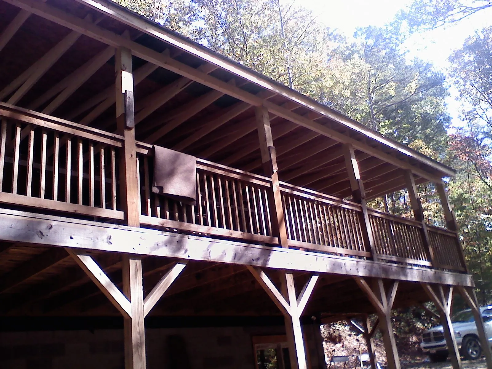 Timber framing under a new elevated porch and deck — Roof Leak Repair in Yuma by Roofing Brothers